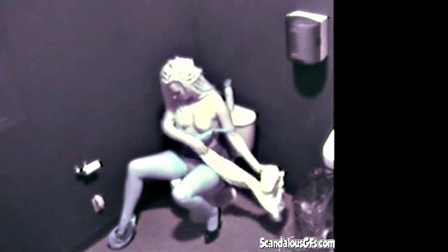 Blonde hottie masturbates in public toilet & gets naughty with a voyeur