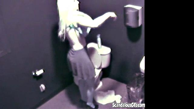 Blonde hottie masturbates in public toilet & gets naughty with a voyeur