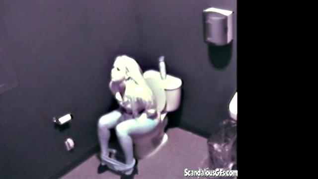 Blonde hottie masturbates in public toilet & gets naughty with a voyeur
