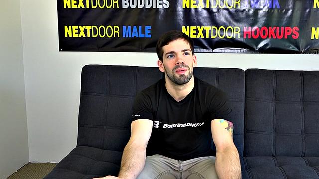 Muscular inked solo amateur masturbates on casting couch