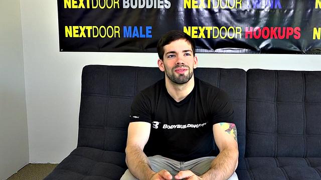 Muscular inked solo amateur masturbates on casting couch