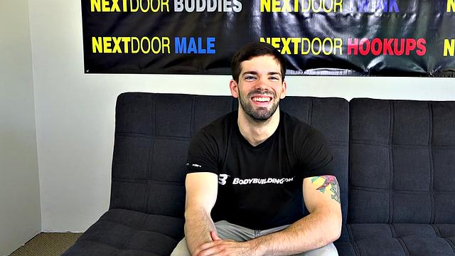 Muscular inked solo amateur masturbates on casting couch