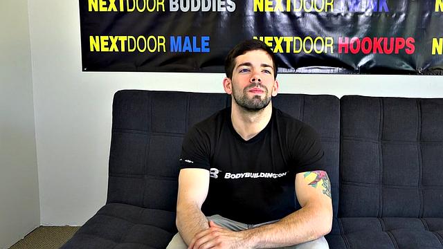 Muscular inked solo amateur masturbates on casting couch