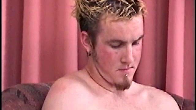 Skater boys come in from a hard day of skating to relax in their air conditioned room. Dark haired Dean takes his cock out first and Matt quickly follows, wetting his cock before stroking it.