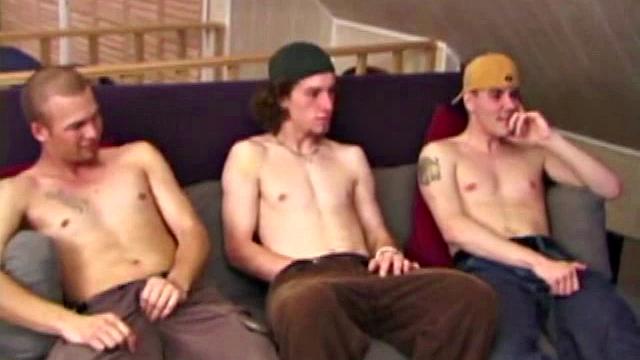 Stephen and Timmy watch porn as Adam joins them. All three naked, stroking cocks. Stephen's lips around Adam's dick.