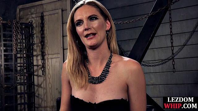 Horny lezdoms dominating tied babe