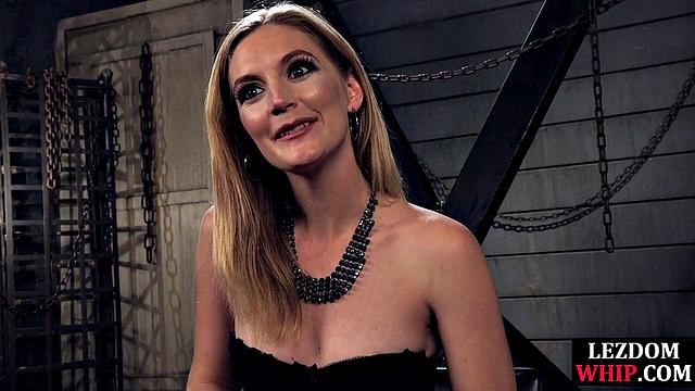 Horny lezdoms dominating tied babe