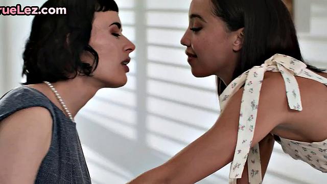 Ebony lesbo strapon by her inked lover in hot affair