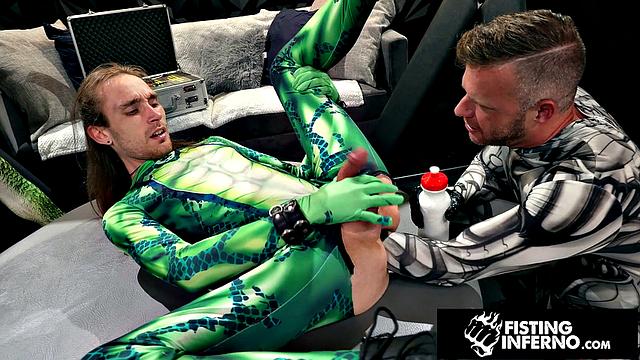 Hero Chained & Fisted By Hunk Villain - FistingInferno