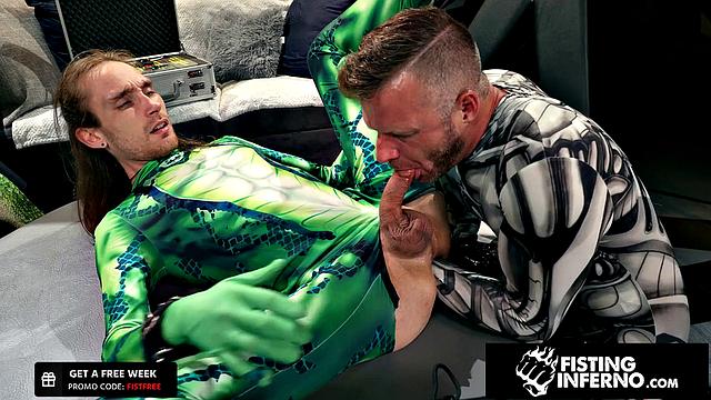 Hero Chained & Fisted By Hunk Villain - FistingInferno