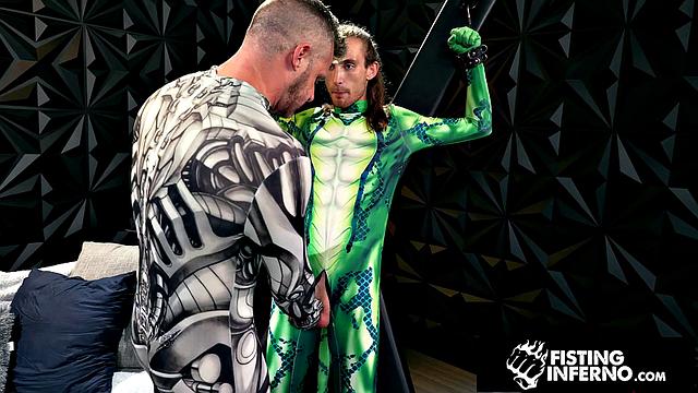 Hero Chained & Fisted By Hunk Villain - FistingInferno