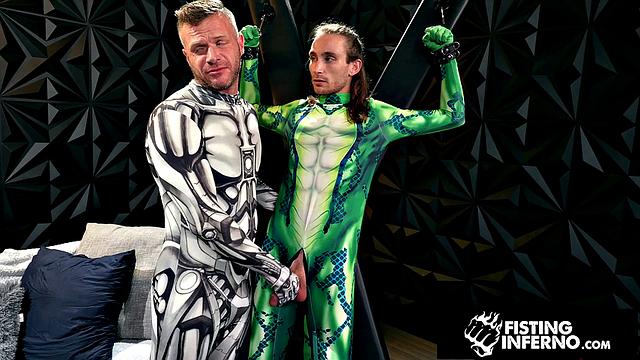 Hero Chained & Fisted By Hunk Villain - FistingInferno