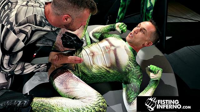 Hero Chained & Fisted By Hunk Villain - FistingInferno