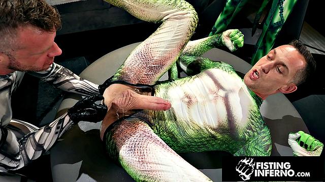 Hero Chained & Fisted By Hunk Villain - FistingInferno