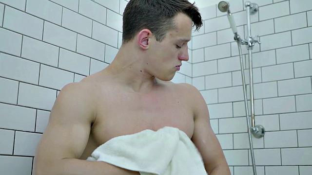 Handsome buff hunk jerking in shower session