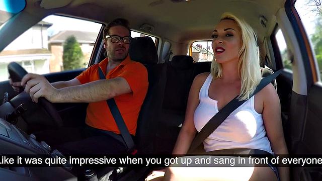 Bigboob British babe sucks off instructor in the car