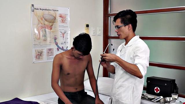 Asian doctor checks twink's ass with sex and medical toys