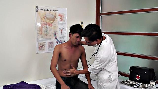 Asian doctor checks twink's ass with sex and medical toys