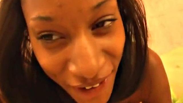 Petite ebony teen sucking cock