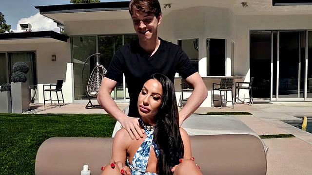 Tattooed brunette gets her puffy nipples licked in the pool by her man