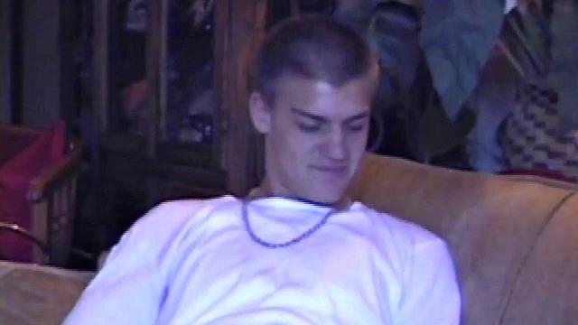 Lance starts this scene sitting on the sofa with his sweats pulled down just below his balls. Lance talks to the camera a bit, asking if we like his dick.
