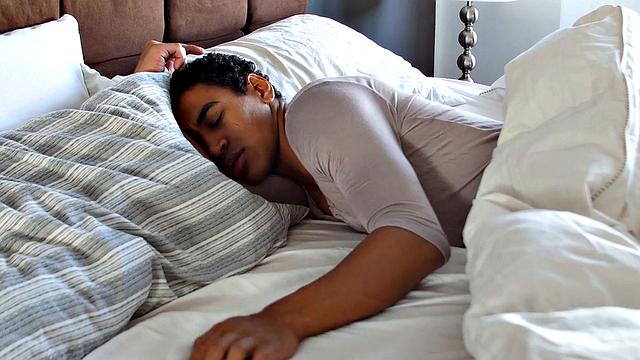 Dominant man takes control of his submissive lover in passionate gay scene