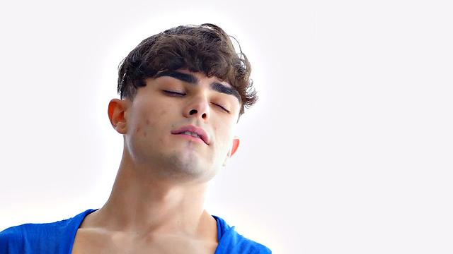 Dominant man takes control of his submissive lover in passionate gay scene