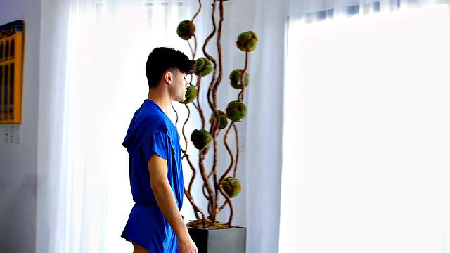Dominant man takes control of his submissive lover in passionate gay scene