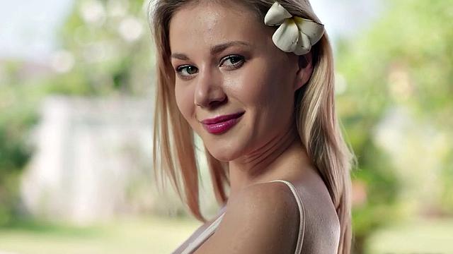 Blonde babe loses control and gets her bald pussy pierced in the pool