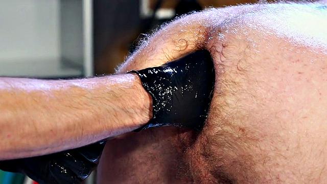 Athletic cocksucker fisting partners in office