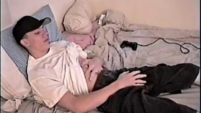 By the time Shane pulls out his stiff dick, it's already leaking. He goes to stroke his hard meat, soon informs it's getting close. This young man is horny and has to nut, so he's having difficulty holding it back.