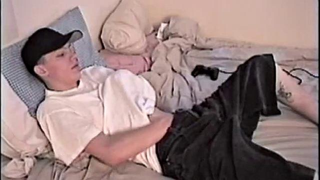 By the time Shane pulls out his stiff dick, it's already leaking. He goes to stroke his hard meat, soon informs it's getting close. This young man is horny and has to nut, so he's having difficulty holding it back.