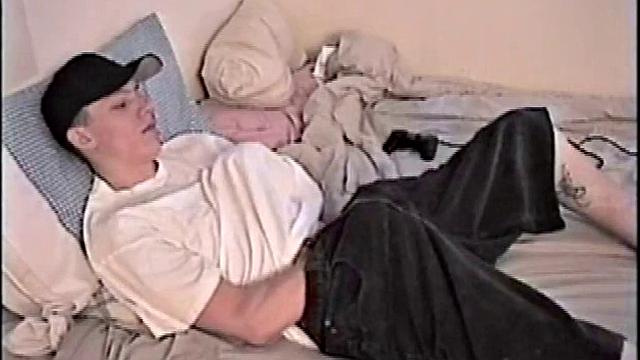 By the time Shane pulls out his stiff dick, it's already leaking. He goes to stroke his hard meat, soon informs it's getting close. This young man is horny and has to nut, so he's having difficulty holding it back.