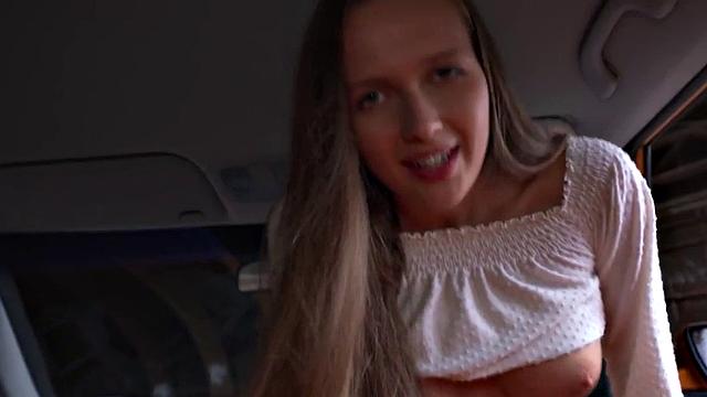 Petite driving student stretched