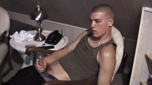 Horny Lance pulls out his cock and quickly gets hard. He strokes his meat and it isn't long before he's blowing a load all over his shirt. Then he shows the camera his cum, before licking it up.