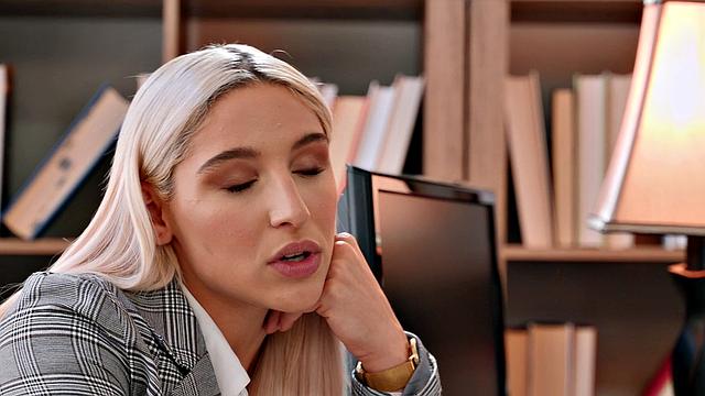 Naughty blonde learns to pleasure herself in the office