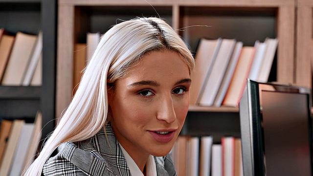 Naughty blonde learns to pleasure herself in the office