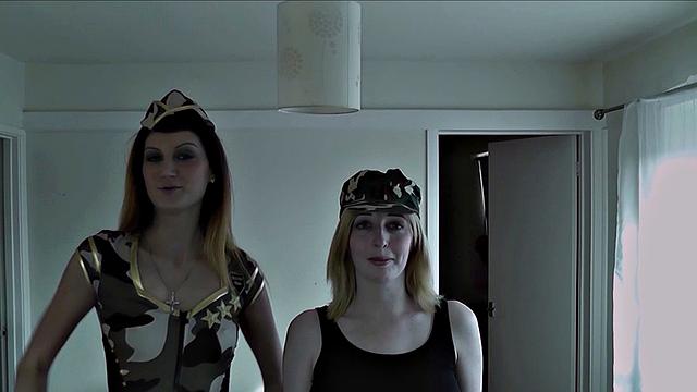 Eva and Jessica sucking on soldier's cock