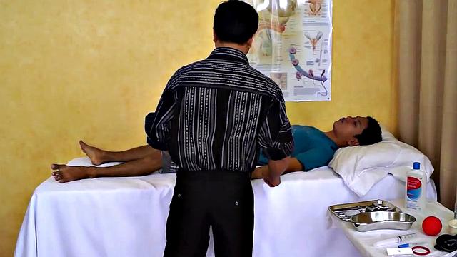 Asian doctor helping twinks cock with blowjob