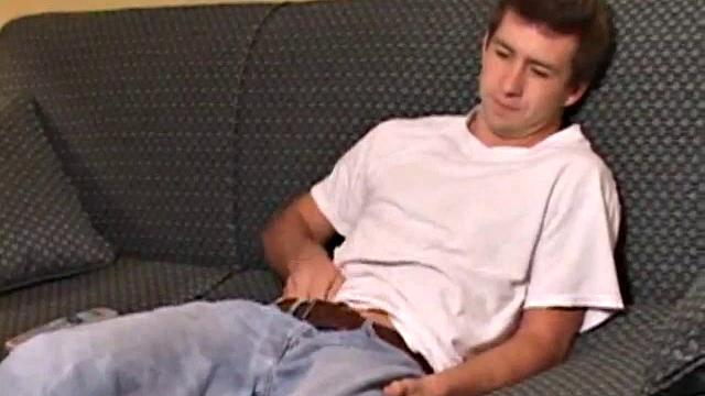 As the video plays, young Donovan Woodside kicks back on a couch and works up a stiff one. Some serious stroking follows, with a little ass play for added stimulation.