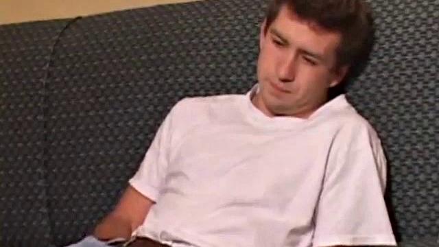 As the video plays, young Donovan Woodside kicks back on a couch and works up a stiff one. Some serious stroking follows, with a little ass play for added stimulation.