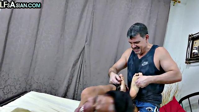 Tickled Asian twink barebacked by white gaydaddy top