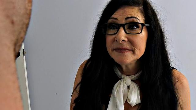 Hairy cougar in stockings rides cock