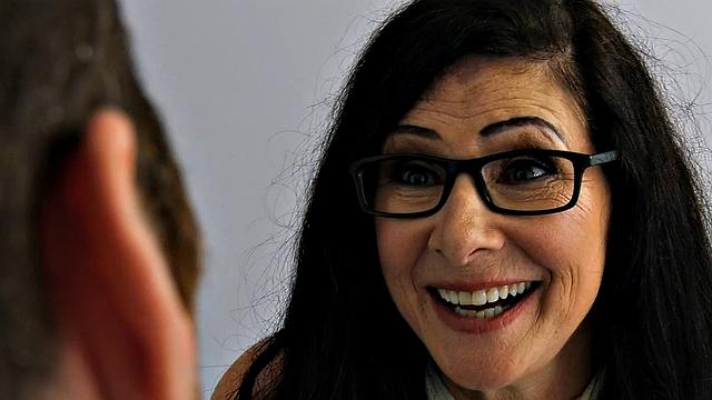 Hairy cougar in stockings rides cock