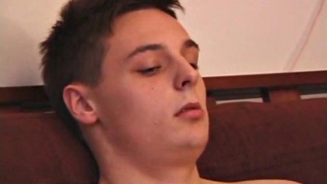 Young stud Gunner Raines needs to release three days of cum, so he puts in a porn video and begins stroking. He plays with his lubed-up cock and soon blasts a warm load onto his tummy. Then Gunner licks up his mess.