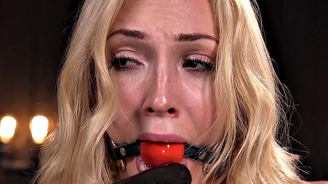 Submissive babe dildoed while being tied up upside down