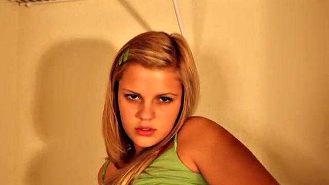 Cute Tabby toys in her washroom