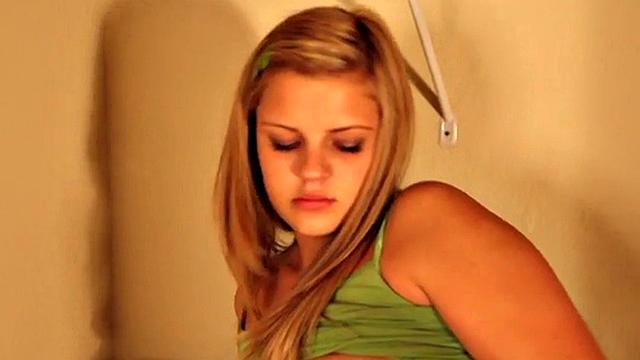 Cute Tabby toys in her washroom