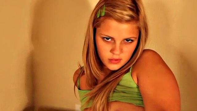 Cute Tabby toys in her washroom