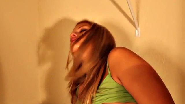 Cute Tabby toys in her washroom